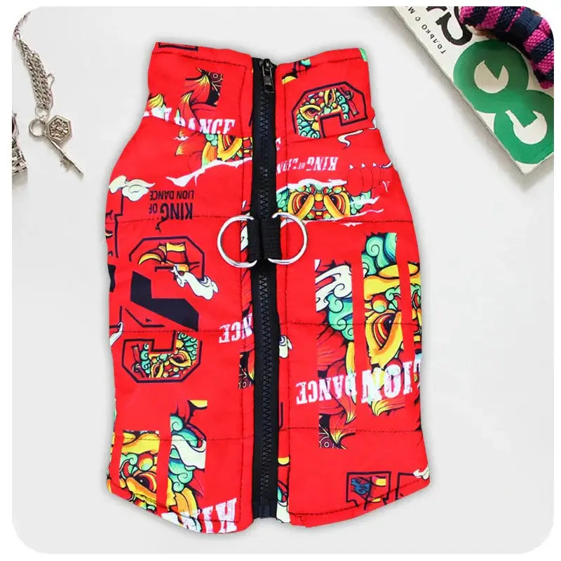Red waterproof dog jacket with harness featuring colorful graphic prints and front zipper for stylish pet outerwear.
