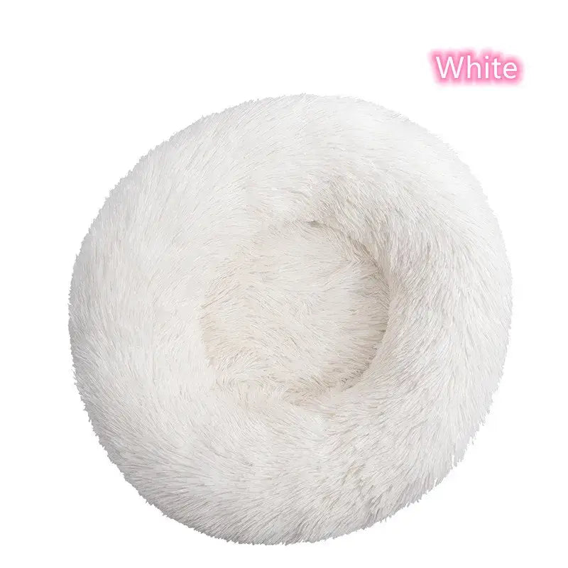White round fluffy pet bed for cats and small dogs, ideal for calming and anxiety relief.