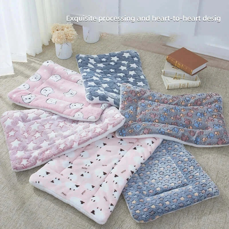 Collection of cozy flannel pet mats in various patterns and colors, ideal for stylish pet bedding and comfort.