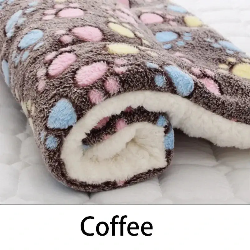 Cozy coffee-colored flannel pet sleeping mat with colorful polka dots and soft backing, ideal for pets.