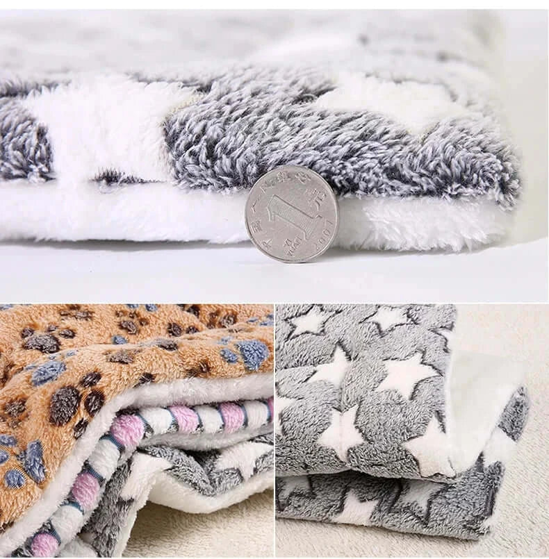 Cozy and soft flannel pet sleeping mat in various patterns, showcasing texture and thickness with a coin for size reference.