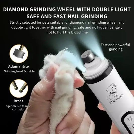 Close-up of a pet nail grinder with double light feature, showing a cat's paw during safe and fast nail grinding.
