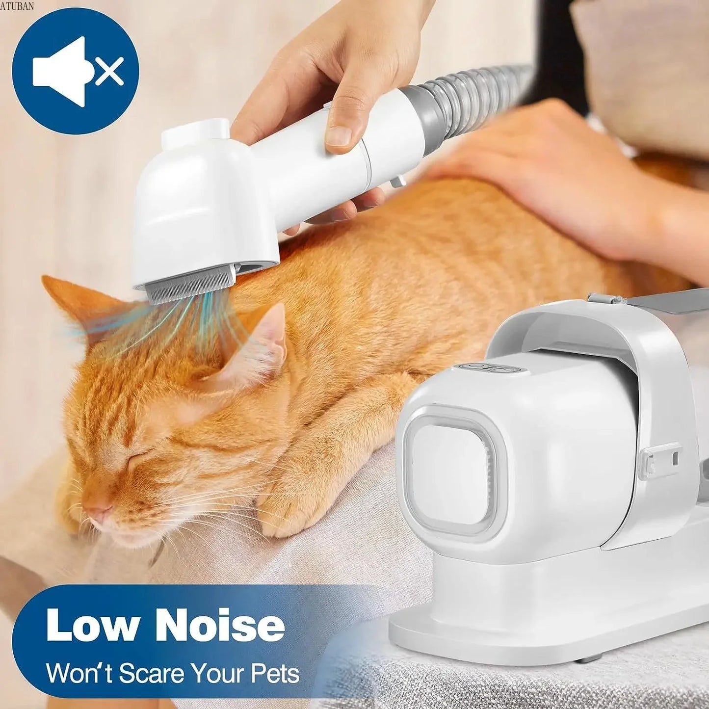 Cat being groomed with a low noise vacuum tool, ideal for pet comfort during grooming sessions.