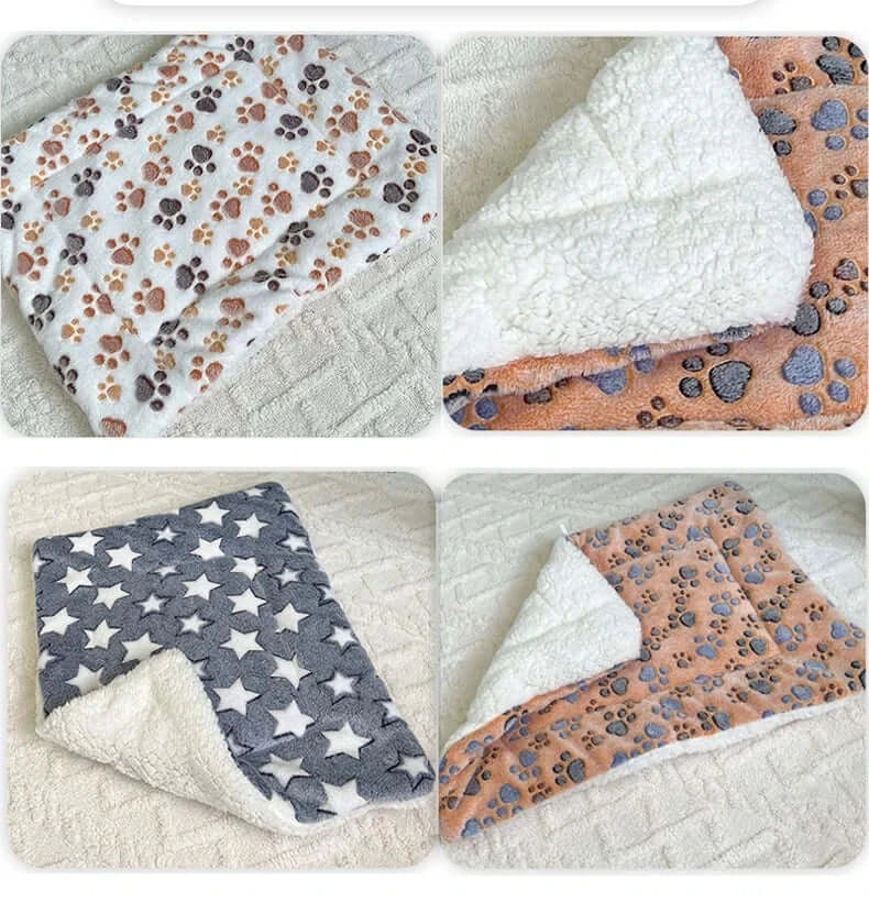 Cozy coral velvet pet blankets with paw and star patterns, perfect for pets to snuggle and stay warm.