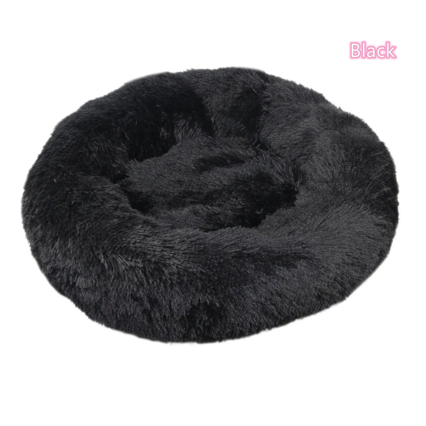 Black plush round donut pet bed for dogs and cats, offering comfort and anxiety relief for small pets.