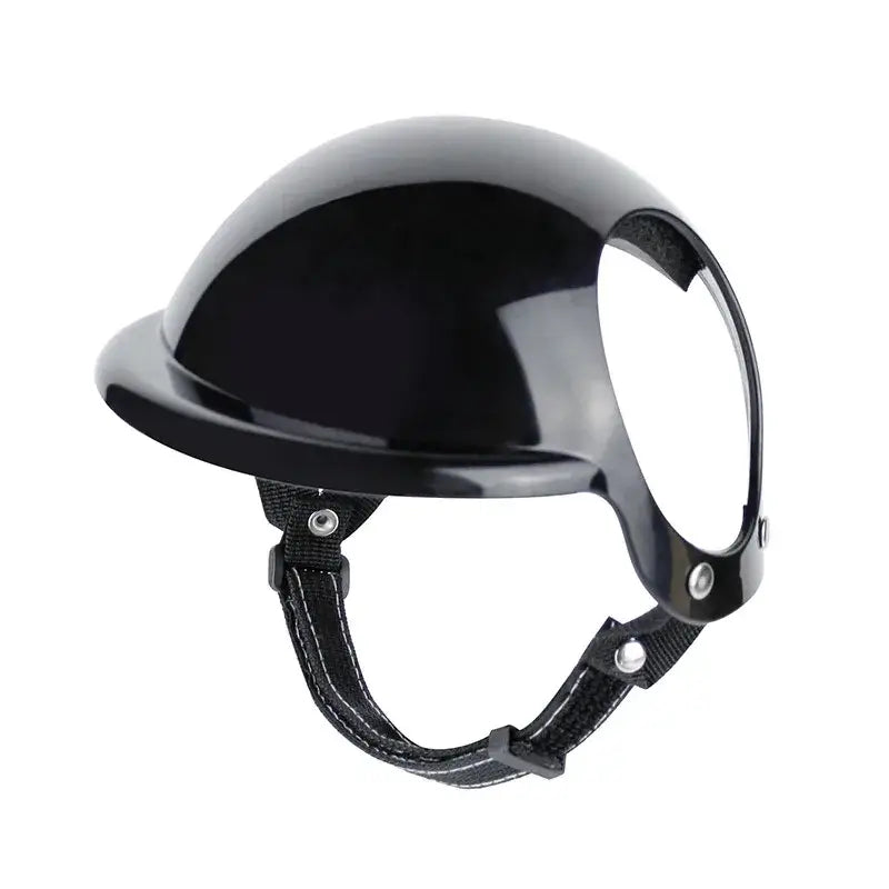 Black pet motorcycle helmet with adjustable strap for dogs and cats, designed for safety and style during outdoor adventures.