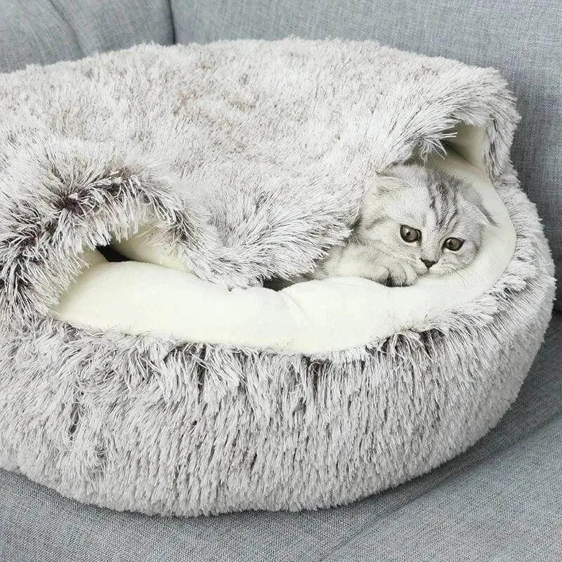 CatNap Pet Bed with cozy gray plush covering, providing ultimate comfort and security for a cat inside.