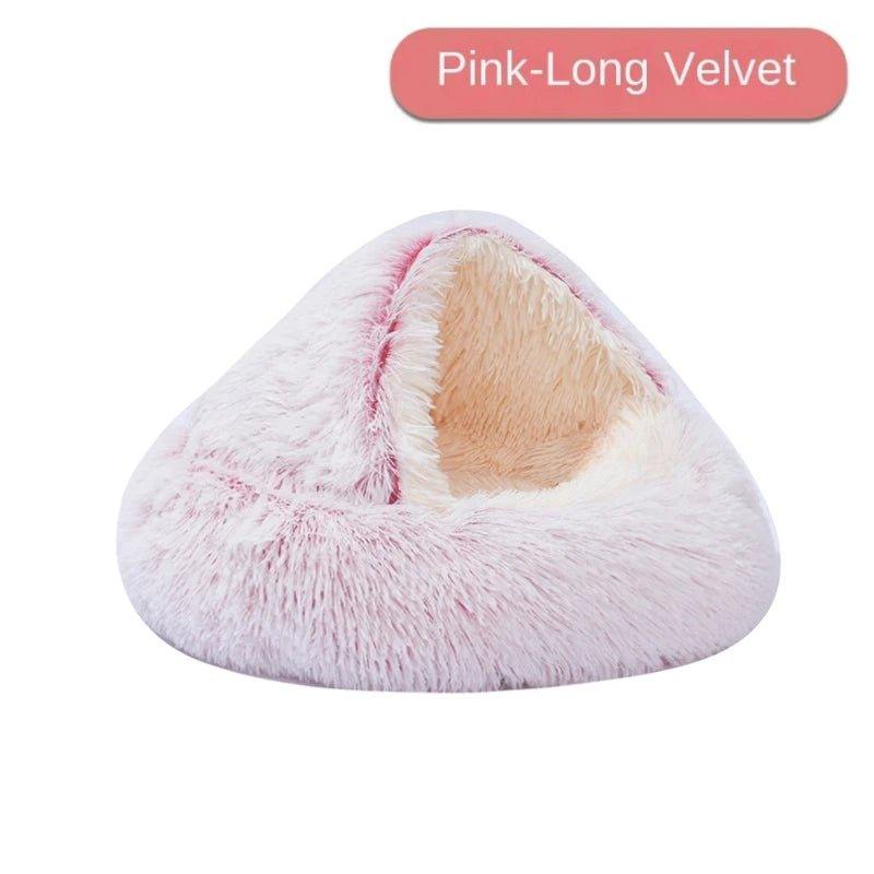 Pink CatNap Pet Bed made of long velvet material, offering a cozy, secure retreat for pets to relax and sleep.