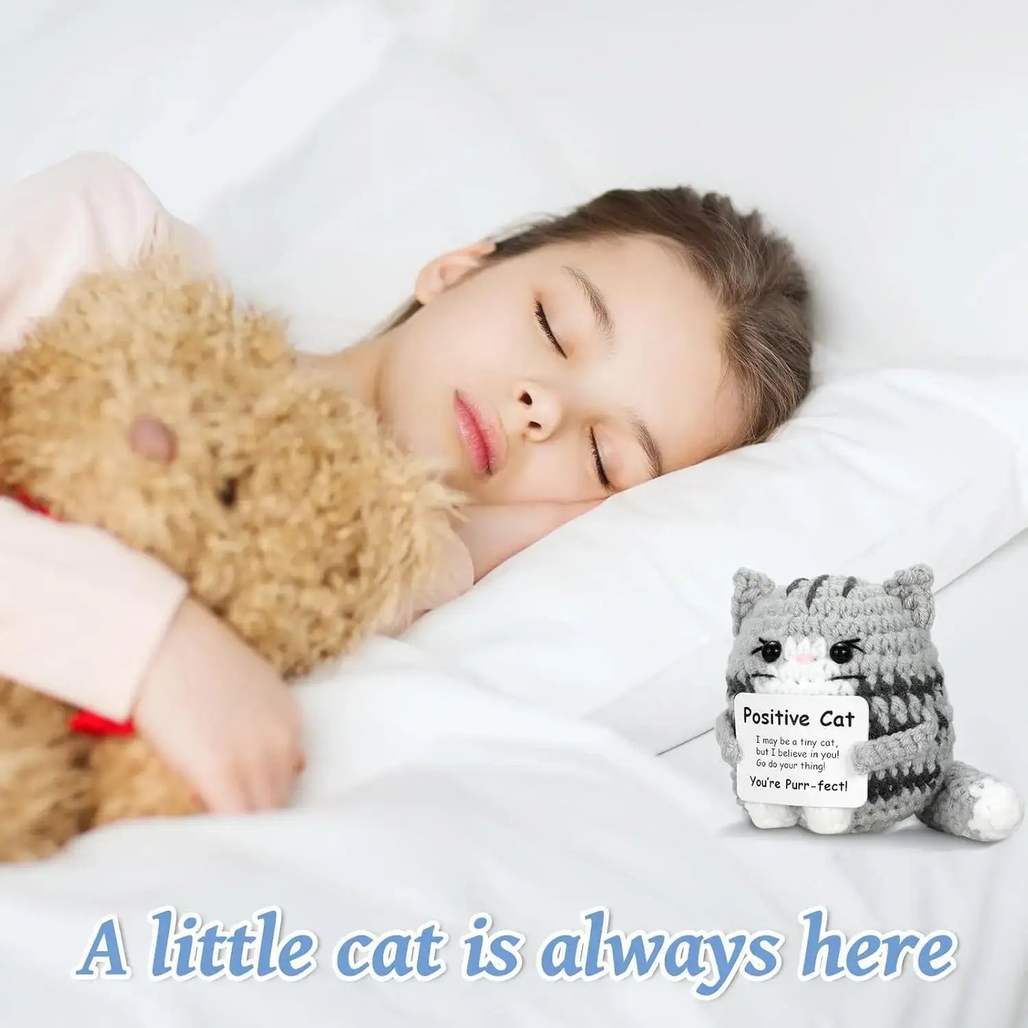 Child sleeping peacefully with a handmade crochet cat ornament doll, conveying warmth and positive energy.