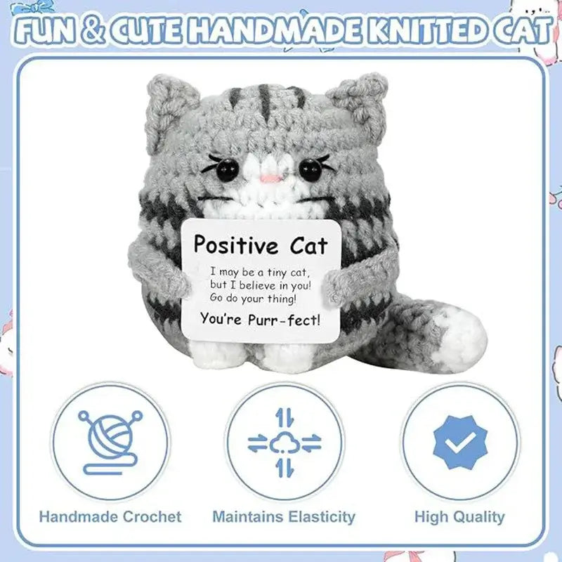 Handmade crochet cat doll with positive message, perfect for home decor or gifting.