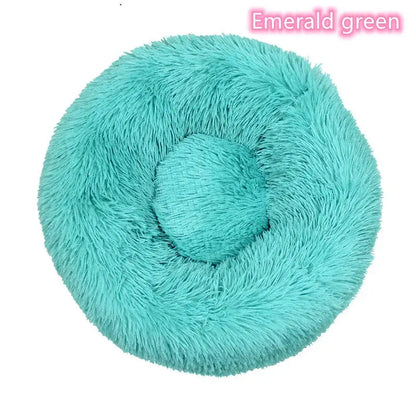Emerald green fluffy round pet bed for dogs and cats, ideal for comfort and calming during naps.