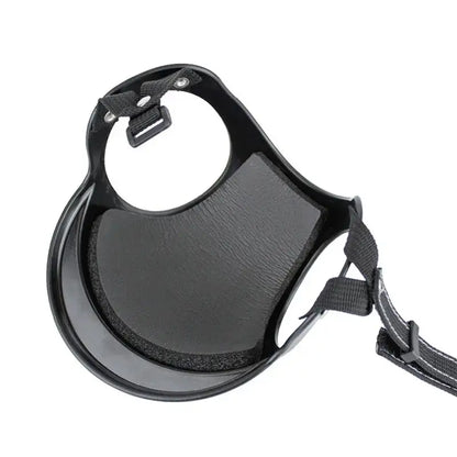 Durable black pet helmet interior with adjustable strap for secure fit and head protection for dogs and cats.