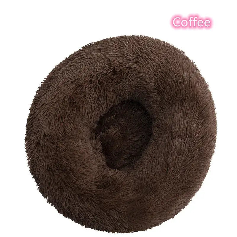 Cozy brown plush round dog donut bed, ideal for calming pets and promoting better rest. Perfect for small dogs and cats.